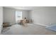 Spacious bonus room with natural light from the window and lots of play space at 9537 Crossfield Rd, Avon, IN 46123