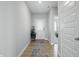 Bright entryway with hardwood floors and white trim, illuminated by natural light at 9537 Crossfield Rd, Avon, IN 46123