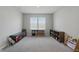 Spacious living room with neutral carpet, lots of natural light and storage at 9537 Crossfield Rd, Avon, IN 46123