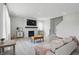 Spacious living room featuring a fireplace, neutral tones, and ample natural light at 9537 Crossfield Rd, Avon, IN 46123