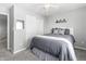 Cozy bedroom with ceiling fan, neutral walls, and closet doors at 9709 Prairie Smoke Dr, Noblesville, IN 46060