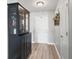 Clean foyer showcasing cabinet, white trim, and a neutral color palette at 9709 Prairie Smoke Dr, Noblesville, IN 46060