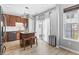 Modern kitchen featuring stainless steel appliances, granite countertops, and a center island with seating at 9709 Prairie Smoke Dr, Noblesville, IN 46060