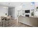 Open concept living area seamlessly connecting the dining and living spaces at 9709 Prairie Smoke Dr, Noblesville, IN 46060