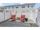 Private backyard patio with a fence and comfortable seating area at 9709 Prairie Smoke Dr, Noblesville, IN 46060