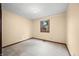 Cozy bedroom with carpet, a window providing natural light, and neutral wall color, creating a relaxing atmosphere at 1105 Sarah Ct, Greenwood, IN 46142