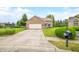 Charming brick home featuring an attached garage, well-manicured lawn, and welcoming curb appeal at 1105 Sarah Ct, Greenwood, IN 46142