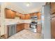 Inviting kitchen showcasing stainless appliances, ample cabinetry and neutral countertops at 1105 Sarah Ct, Greenwood, IN 46142