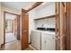 Convenient laundry room with washer and dryer, adjacent to the main living area at 1105 Sarah Ct, Greenwood, IN 46142