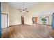 Bright living area featuring laminate flooring, open layout, and easy access to kitchen and dining at 1105 Sarah Ct, Greenwood, IN 46142