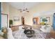 Well-lit living room showcasing an open floor plan, updated decor, and seamless flow to kitchen at 1105 Sarah Ct, Greenwood, IN 46142