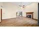 Open living area with high ceilings, fireplace, and hardwood floors perfect for entertaining at 1105 Sarah Ct, Greenwood, IN 46142