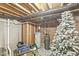 Unfinished basement with exposed ceiling and ductwork, showcasing utility systems and potential for customization at 1107 Mccray Ln, Westfield, IN 46074