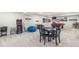 Basement area with arcade game, seating, and pool table, perfect for entertaining at 1107 Mccray Ln, Westfield, IN 46074