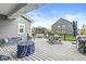 Inviting deck with a hot tub, dining table, and comfortable seating at 1107 Mccray Ln, Westfield, IN 46074