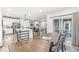 Open dining space with access to kitchen and backyard patio at 1107 Mccray Ln, Westfield, IN 46074