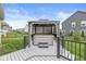Gazebo covered hot tub on a well-maintained deck in a backyard setting at 1107 Mccray Ln, Westfield, IN 46074