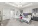 Spacious main bedroom featuring tray ceilings, ensuite bathroom, and neutral decor at 1107 Mccray Ln, Westfield, IN 46074