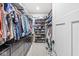 Large walk-in closet with custom shelving and ample storage space for clothing and accessories at 1107 Mccray Ln, Westfield, IN 46074