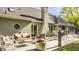 Expansive back deck featuring outdoor seating, a fire pit, and a dining area, ideal for gatherings and enjoying the serene surroundings at 11823 E 200 S, Zionsville, IN 46077