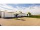Exterior view of a large white barn with riding arena at 11823 E 200 S, Zionsville, IN 46077