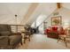 Attic bonus room featuring seating area, desk, and loft at 11823 E 200 S, Zionsville, IN 46077
