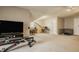 Spacious bonus room with a tv and exercise equipment, offering versatile living and recreational opportunities at 11823 E 200 S, Zionsville, IN 46077