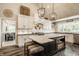 Stylish kitchen with a center island, pendant lighting, and modern appliances at 11823 E 200 S, Zionsville, IN 46077