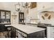 Gourmet kitchen features a large island, stainless steel appliances, and custom cabinetry at 11823 E 200 S, Zionsville, IN 46077