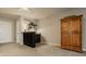 Bright living area featuring a bar with wood cabinetry, shelves, and a light countertop at 11823 E 200 S, Zionsville, IN 46077