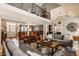 Spacious living room with high ceilings, comfortable seating, and an open floor plan at 11823 E 200 S, Zionsville, IN 46077