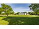 Expansive green property with a large white barn and black fencing at 11823 E 200 S, Zionsville, IN 46077