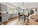 Modern kitchen with stainless steel appliances, granite countertops, and open layout at 1205 N Temple Ave, Indianapolis, IN 46201