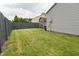 Fenced backyard with a shed and well-maintained lawn at 1219 Citation W Cir, Lebanon, IN 46052