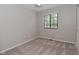 Neutral bedroom features a window and closet at 1219 Citation W Cir, Lebanon, IN 46052