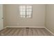 Bedroom with neutral carpeting and a large window for natural light at 1219 Citation W Cir, Lebanon, IN 46052