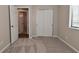 Carpeted bedroom with closet and neutral walls at 1219 Citation W Cir, Lebanon, IN 46052