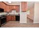 Charming kitchen with wood cabinetry, stainless steel appliances, and an open layout at 1219 Citation W Cir, Lebanon, IN 46052
