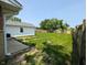 A spacious backyard with a garage and a well-maintained lawn at 1359 S Mulberry St, Martinsville, IN 46151