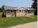 Charming single-story brick home with a well-maintained lawn and a new roof at 1359 S Mulberry St, Martinsville, IN 46151