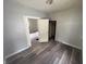 Comfortable bedroom features neutral walls and modern flooring, enhancing its appeal at 1445 W 34Th St, Indianapolis, IN 46208