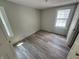 This bedroom features neutral walls and modern flooring at 1445 W 34Th St, Indianapolis, IN 46208