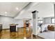 Open basement design with a sauna, bar, and workout area, perfect for recreation and relaxation at 14458 Smickle Ln, Carmel, IN 46033