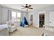 Bright Bedroom with crib, large window, play tent and closet, with light-filled cozy atmosphere at 14458 Smickle Ln, Carmel, IN 46033