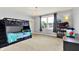 Bright room with bunk beds, a charming chandelier, storage, and lots of natural light at 14458 Smickle Ln, Carmel, IN 46033