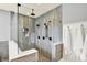 This luxurious walk-in shower features dual shower heads and decorative accent tiles at 14458 Smickle Ln, Carmel, IN 46033