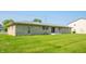 Expansive backyard with lush green grass, providing a serene outdoor space at 1460 W Mckay Rd, Shelbyville, IN 46176