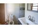 Modern bathroom with white basin sink, new tile shower and contemporary fixtures at 1460 W Mckay Rd, Shelbyville, IN 46176