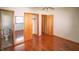 Bedroom with hardwood floors, closet and en-suite bathroom with toilet at 1460 W Mckay Rd, Shelbyville, IN 46176