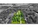 Aerial shot showcases property layout, outlining the home, pool, and surrounding landscape at 14918 E 206Th St, Noblesville, IN 46060